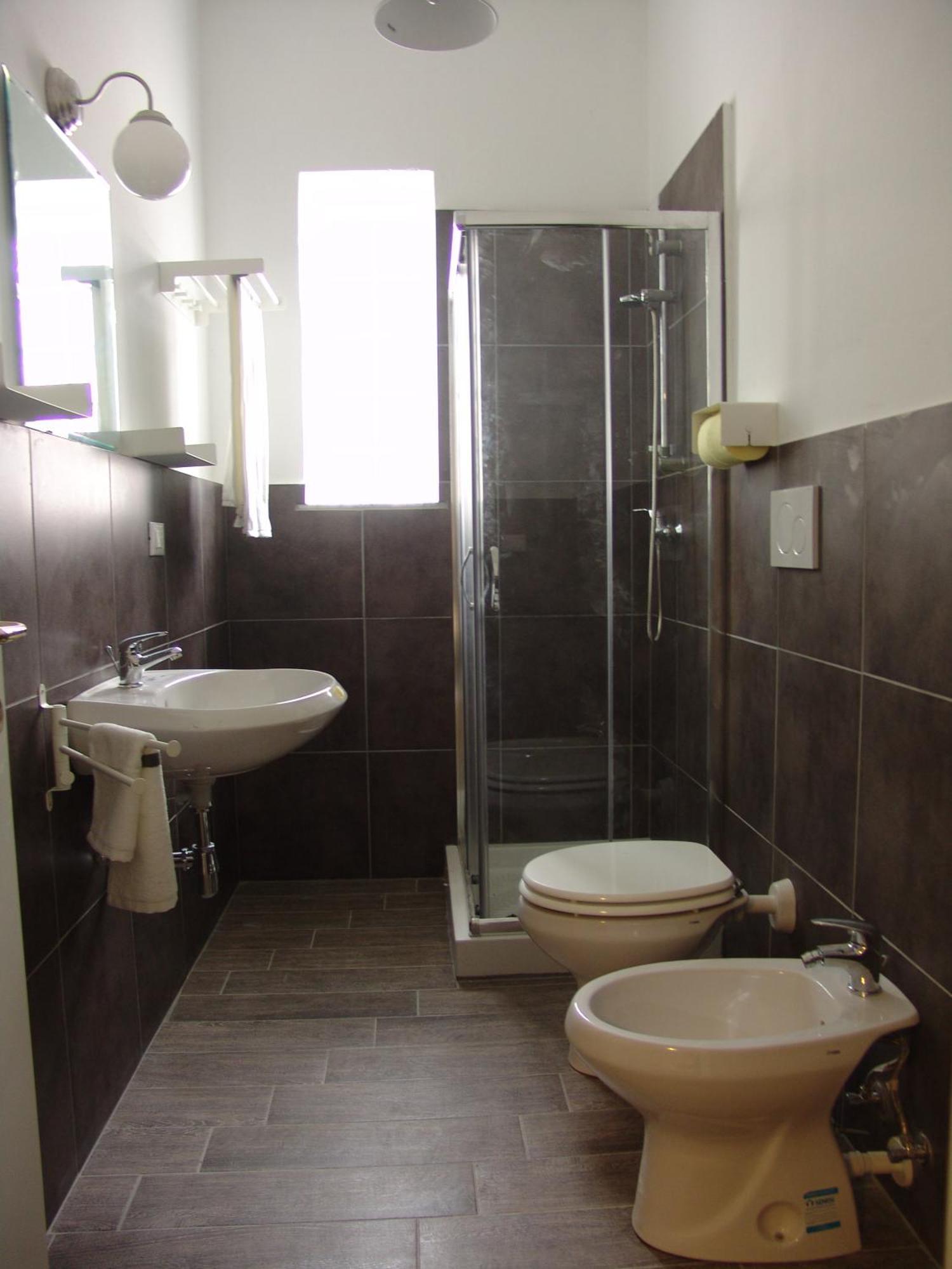 Habitación Triple Confort con ducha